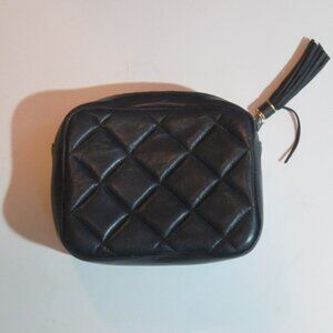 Small black leather clutch bag, with zipper close.